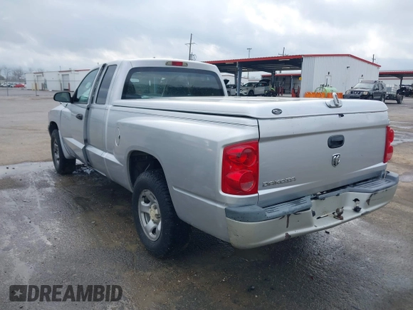 2005 Dodge Dakota ST with VIN 1D7HE22K25S119460, listed as a IAAI auction lot 41790592 with 104,995 mi miles and . Bid and sale history available at DreamBid. Image 3.