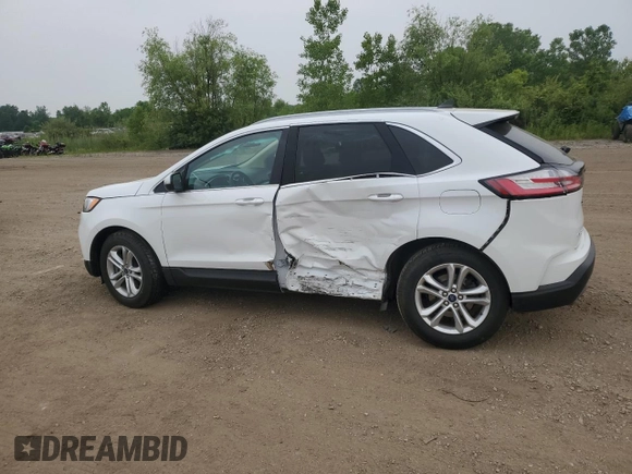 2020 Ford Edge SEL z VIN 2FMPK4J95LBB21392, wystawiony jako Copart lot #60912275 z przebiegiem 82 527 mil mil oraz Szkoda całkowita • Salvage title. Historia ofert i sprzedaży dostępna na DreamBid. Obrazek 2.