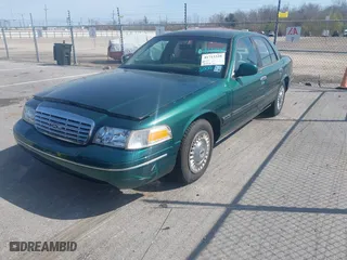 2000 Ford Crown Victoria with VIN 2FAFP73W9YX117108, listed as a IAAI auction lot 41713328 with 83,018 mi miles. Bid and sale history available at carsss.com. Image 2.
