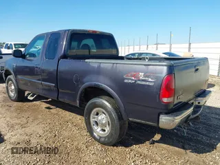 1999 Ford F-150 with VIN 1FTRX18W5XNA08724, listed as a IAAI auction lot 41484808 with Not provided miles and . Bid and sale history available at DreamBid. Image 3.