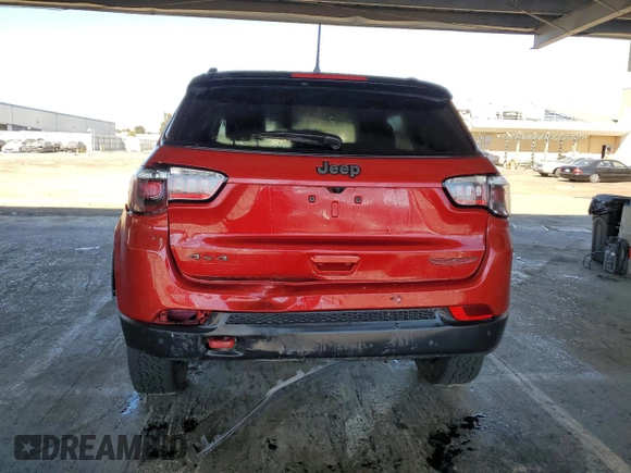 2025 Jeep Compass Trailhawk with VIN 3C4NJDDNXST553759, listed as a Copart auction lot 64247685 with 9,314 mi miles and Salvage title. Bid and sale history available at DreamBid. Image 6.