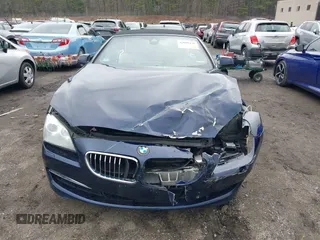 2013 BMW 6 Series 640i with VIN WBALW7C51DDX58713, listed as a IAAI auction lot 42005436 with 77,563 mi miles and . Bid and sale history available at carsss.com. Image 13.