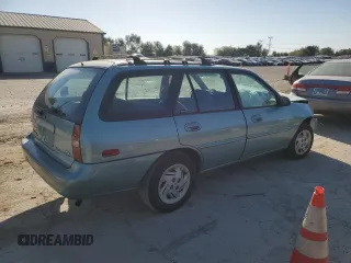 1997 Ford Escort LX with VIN 3FALP15P7VR172687, listed as a Copart auction lot 74506914 with 92,314 mi miles and Salvage Title. Bid and sale history available at carsss.com. Image 3.