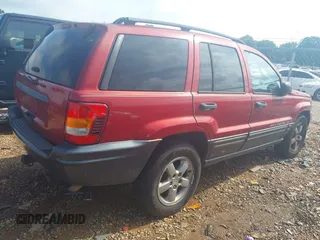2004 Jeep Grand Cherokee Laredo with VIN 1J4GW48S34C419596, listed as a IAAI auction lot 42515494 with 276,196 mi miles and . Bid and sale history available at DreamBid. Image 4.
