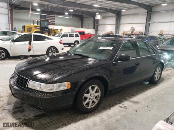 2002 Cadillac Seville Touring STS with VIN 1G6KY54962U158476, listed as a Copart auction lot 86624774 with 77,818 mi miles and Salvage Title. Bid and sale history available at carsss.com. Image 1.