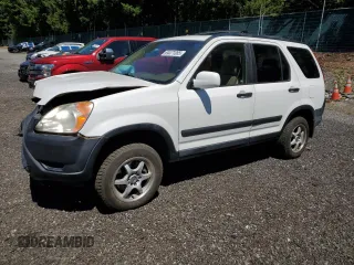 2002 Honda CR-V EX with VIN JHLRD788X2C046454, listed as a Copart auction lot 64471085 with 317,508 mi miles and Salvage title. Bid and sale history available at DreamBid. Image 1.