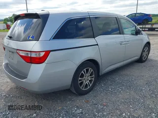 2012 Honda Odyssey EX-L with VIN 5FNRL5H63CB063815, listed as a IAAI auction lot 42302937 with 377,768 mi miles and . Bid and sale history available at DreamBid. Image 4.