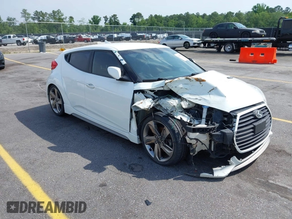 2013 Hyundai Veloster Turbo z VIN KMHTC6AE6DU112233, wystawiony jako IAAI lot #42295962 z przebiegiem 151 091 mil mil oraz . Historia ofert i sprzedaży dostępna na DreamBid. Obrazek 1.