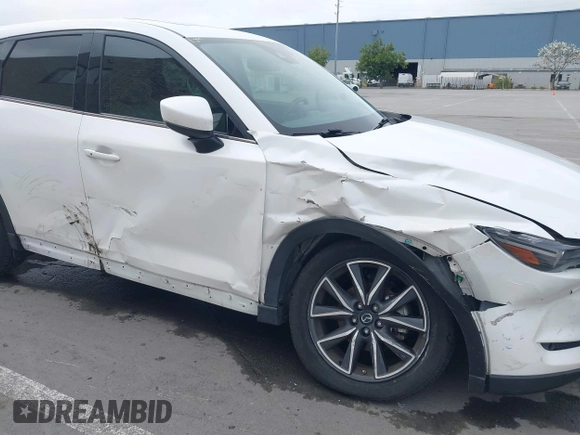 2018 Mazda CX-5 Grand Touring with VIN JM3KFADM1J0309995, listed as a IAAI auction lot 41977003 with 75,303 mi miles. Bid and sale history available at carsss.com. Image 6.