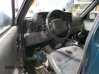 1997 Jeep Cherokee Sport with VIN 1J4FJ68S7VL509440, listed as a Copart auction lot 50895195 with 283,662 mi miles and Salvage Title. Bid and sale history available at carsss.com. Image 8.