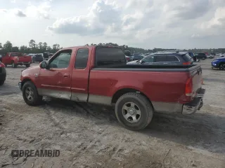 2001 Ford F-150 XL with VIN 1FTRX17W71NB71934, listed as a Copart auction lot 54231605 with 257,867 mi miles and Salvage title. Bid and sale history available at DreamBid. Image 2.