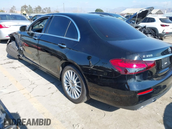 2021 Mercedes-Benz E-Class E 350 with VIN W1KZF8DB0MA889890, listed as a IAAI auction lot 41317094 with 63,075 mi miles. Bid and sale history available at carsss.com. Image 3.