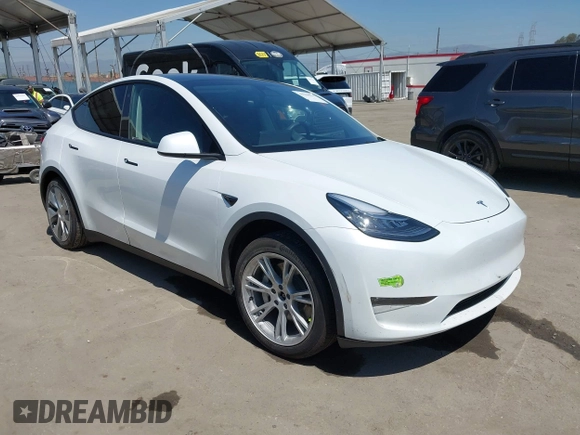 2023 Tesla Model Y Long Range z VIN 7SAYGDEE5PA104635, wystawiony jako IAAI lot #41989014 z przebiegiem 15 347 mil mil oraz . Historia ofert i sprzedaży dostępna na DreamBid. Obrazek 1.