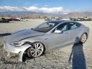 2016 Tesla Model S 90D with VIN 5YJSA1E26GF147974, listed as a Copart auction lot 82815404 with 126,609 mi miles and Salvage Title. Bid and sale history available at DreamBid. Image 1.