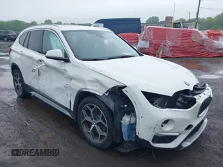 2018 BMW X1 xDrive28i with VIN WBXHT3C38J5L31322, listed as a IAAI auction lot 42260190 with 70,266 mi miles and . Bid and sale history available at DreamBid. Image 18.