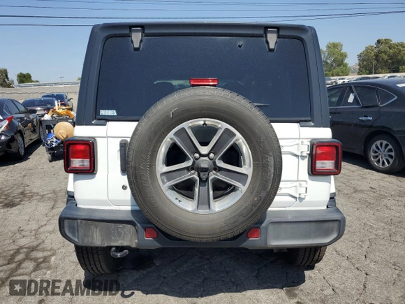 2019 Jeep Wrangler Unlimited Sahara с VIN 1C4HJXEN4KW593522, выставлен на аукционе Copart как лот 57528955 с пробегом 77 382 миль миль и Списание • Salvage title. История ставок и продаж доступна на DreamBid. Изображение 6.