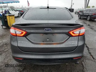 2016 Ford Fusion Titanium Hybrid z VIN 3FA6P0RU5GR356987, wystawiony jako Copart lot #48211775 z przebiegiem 145 192 mil mil oraz Szkoda całkowita • Salvage title. Historia ofert i sprzedaży dostępna na DreamBid. Obrazek 6.