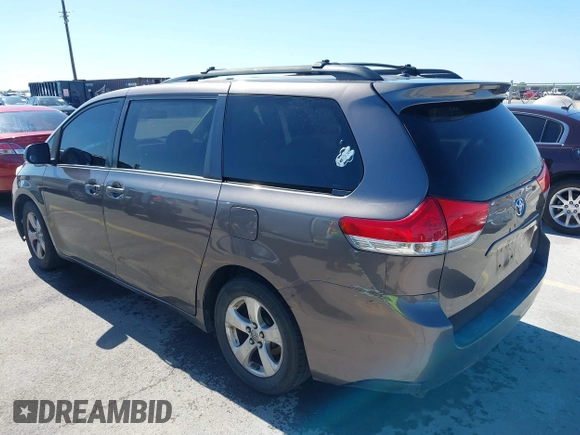 2014 Toyota Sienna LE AAS with VIN 5TDKK3DC8ES457023, listed as a IAAI auction lot 42067713 with 335,130 mi miles. Bid and sale history available at carsss.com. Image 3.