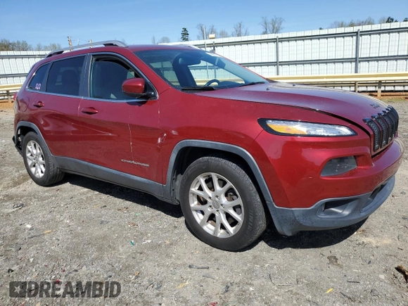 2014 Jeep Cherokee Latitude with VIN 1C4PJLCS2EW186719, listed as a Copart auction lot 50609725 with 140,449 mi miles and Salvage Title. Bid and sale history available at carsss.com. Image 4.