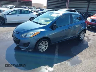 2014 Mazda 2 Sport with VIN JM1DE1KY0E0181555, listed as a IAAI auction lot 41539841 with 121,918 mi miles and . Bid and sale history available at DreamBid. Image 17.
