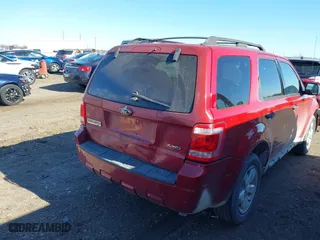 2009 Ford Escape XLT with VIN 1FMCU93G09KB76882, listed as a IAAI auction lot 41810579 with 167,584 mi miles. Bid and sale history available at carsss.com. Image 4.