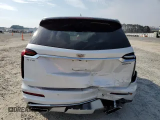2024 Cadillac XT6 FWD Luxury z VIN 1GYKPAR47RZ705252, wystawiony jako Copart lot #49244015 z przebiegiem 26 838 mil mil oraz Szkody całkowita. Historia ofert i sprzedaży dostępna na DreamBid. Obrazek 6.