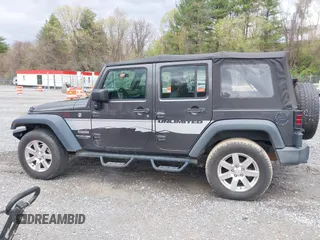 2018 Jeep Wrangler JK Unlimited Sport S with VIN 1C4BJWDG8JL895981, listed as a IAAI auction lot 42048316 with 95,457 mi miles. Bid and sale history available at carsss.com. Image 13.