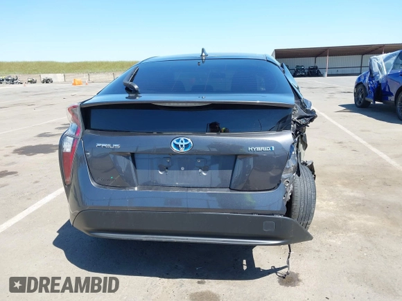 2016 Toyota Prius Two z VIN JTDKBRFU1G3521884, wystawiony jako IAAI lot #42081852 z przebiegiem 93 107 mil mil oraz . Historia ofert i sprzedaży dostępna na DreamBid. Obrazek 16.