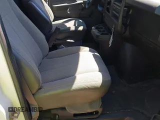 2014 Chevrolet Express Cargo Van with VIN 1GCWGFCA3E1130871, listed as a IAAI auction lot 42166083 with 279,624 mi miles. Bid and sale history available at carsss.com. Image 5.