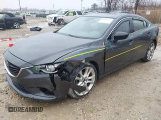 2015 Mazda 6 i Grand Touring with VIN JM1GJ1W56F1207077, listed as a IAAI auction lot 41734641 with 109,447 mi miles and . Bid and sale history available at DreamBid. Image 18.