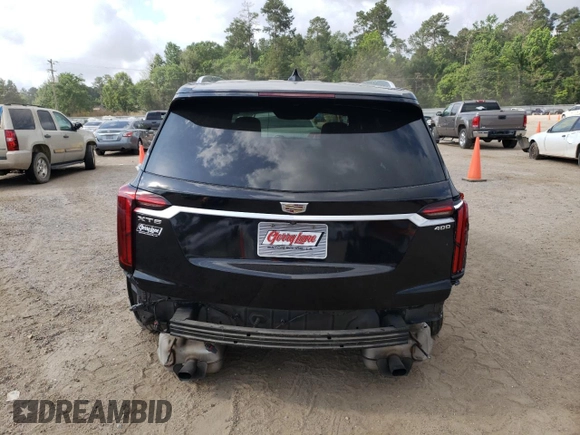 2020 Cadillac XT6 FWD Premium Luxury with VIN 1GYKPCRS6LZ102682, listed as a Copart auction lot 56906645 with 76,884 mi miles and Salvage title. Bid and sale history available at DreamBid. Image 6.