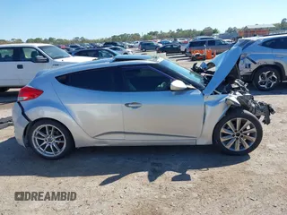 2012 Hyundai Veloster w/Black Int with VIN KMHTC6ADXCU036070, listed as a IAAI auction lot 41779990 with Not provided miles and . Bid and sale history available at DreamBid. Image 13.