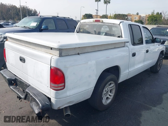 2000 Dodge Dakota Sport with VIN 1B7GL2AN8YS654014, listed as a IAAI auction lot 41470554 with 181,931 mi miles. Bid and sale history available at carsss.com. Image 4.