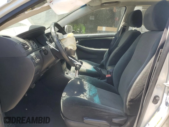 2005 Toyota Corolla CE with VIN 1NXBR30E25Z563171, listed as a Copart auction lot 60606715 with 205,219 mi miles and Salvage title. Bid and sale history available at DreamBid. Image 7.