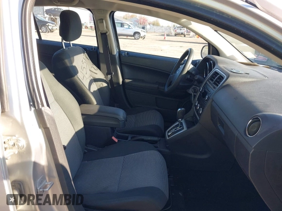 2012 Dodge Caliber SXT with VIN 1C3CDWDAXCD508338, listed as a IAAI auction lot 42091675 with 213,596 mi miles and . Bid and sale history available at DreamBid. Image 5.