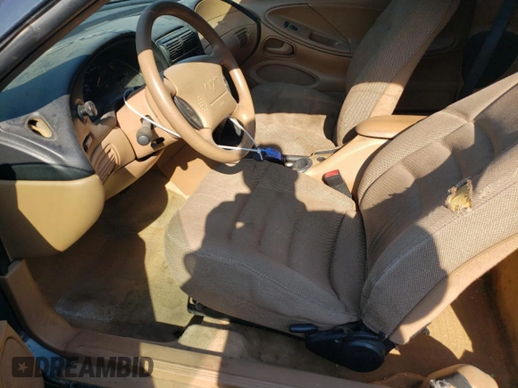 1998 Ford Mustang with VIN 1FAFP444XWF176396, listed as a Copart auction lot 61322984 with 86,168 mi miles and Salvage title. Bid and sale history available at DreamBid. Image 7.