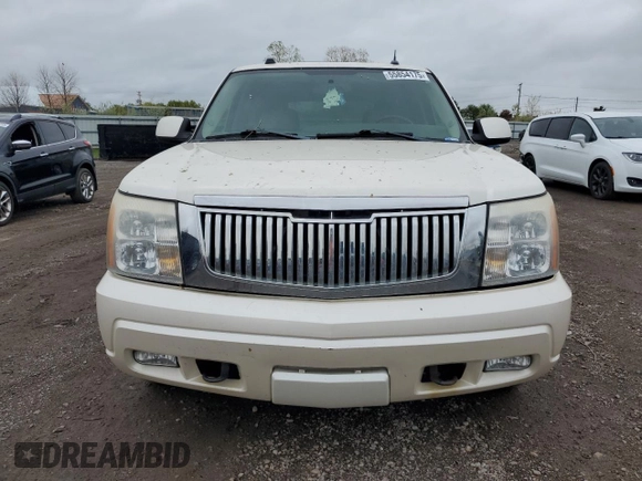 2005 Cadillac Escalade z VIN 1GYEK63N95R204674, wystawiony jako Copart lot #55854175 z przebiegiem 303 771 mil mil oraz Tytuł czysty. Historia ofert i sprzedaży dostępna na DreamBid. Obrazek 5.