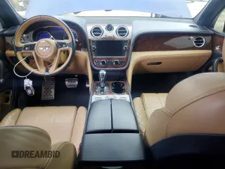 2017 Bentley Bentayga W12 z VIN SJAAC2ZV2HC014080, wystawiony jako Copart lot #44806115 z przebiegiem 63 077 mil mil oraz Szkody całkowita. Historia ofert i sprzedaży dostępna na DreamBid. Obrazek 8.