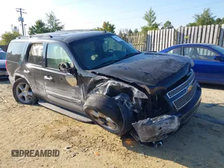 2007 Chevrolet Tahoe LTZ z VIN 1GNFK13037J325405, wystawiony jako IAAI lot #40521222 z przebiegiem 162 182 mil mil oraz . Historia ofert i sprzedaży dostępna na DreamBid. Obrazek 6.