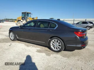 2018 BMW 7 Series 740i with VIN WBA7E2C55JG742497, listed as a Copart auction lot 82173994 with 52,354 mi miles and Salvage Title. Bid and sale history available at carsss.com. Image 2.
