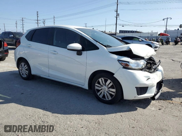 2015 Honda Fit LX with VIN 3HGGK5G55FM747740, listed as a Copart auction lot 61692725 with 61,923 mi miles and Salvage title. Bid and sale history available at DreamBid. Image 4.