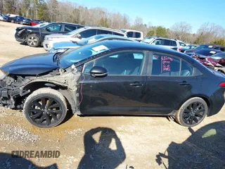 2021 Toyota Corolla SE with VIN 5YFS4MCE5MP060850, listed as a IAAI auction lot 41223430 with 102,206 mi miles. Bid and sale history available at carsss.com. Image 15.