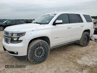 2016 Chevrolet Tahoe LTZ with VIN 1GNSKCKCXGR145149, listed as a Copart auction lot 59490265 with 162,848 mi miles and Salvage title. Bid and sale history available at DreamBid. Image 1.