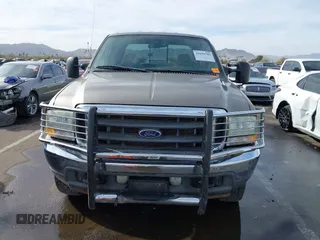 2003 Ford F-350 XL z VIN 1FTSW31P63EC46630, wystawiony jako IAAI lot #41699789 z przebiegiem 129 633 mil mil oraz . Historia ofert i sprzedaży dostępna na DreamBid. Obrazek 12.