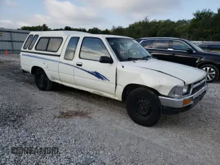 1993 Toyota Pickup DLX z VIN JT4RN93P7P5074129, wystawiony jako Copart lot #72893054 z przebiegiem 235 053 mil mil oraz Szkoda całkowita • Salvage title. Historia ofert i sprzedaży dostępna na DreamBid. Obrazek 4.
