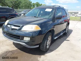 2006 Acura MDX Touring w/Navi with VIN 2HNYD18886H530531, listed as a IAAI auction lot 42045364 with 174,528 mi miles. Bid and sale history available at carsss.com. Image 2.