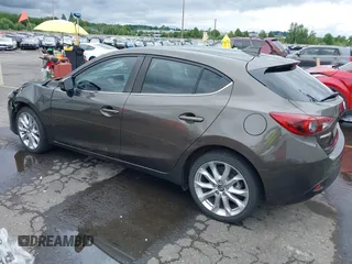 2014 Mazda 3 S Grand Touring with VIN JM1BM1M3XE1164610, listed as a IAAI auction lot 42421946 with 96,591 mi miles and . Bid and sale history available at DreamBid. Image 3.