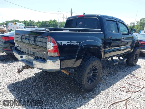 2015 Toyota Tacoma with VIN 5TFLU4EN9FX143428, listed as a IAAI auction lot 42173370 with 200,447 mi miles and . Bid and sale history available at DreamBid. Image 4.