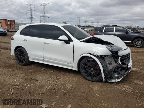 2016 Porsche Cayenne GTS with VIN WP1AD2A27GLA76553, listed as a Copart auction lot 53569615 with 69,761 mi miles and Salvage title. Bid and sale history available at DreamBid. Image 4.