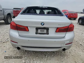 2018 BMW 5 Series 530e xDrive with VIN WBAJB1C58JB084292, listed as a Copart auction lot 51213575 with 105,277 mi miles and Clean title. Bid and sale history available at DreamBid. Image 6.